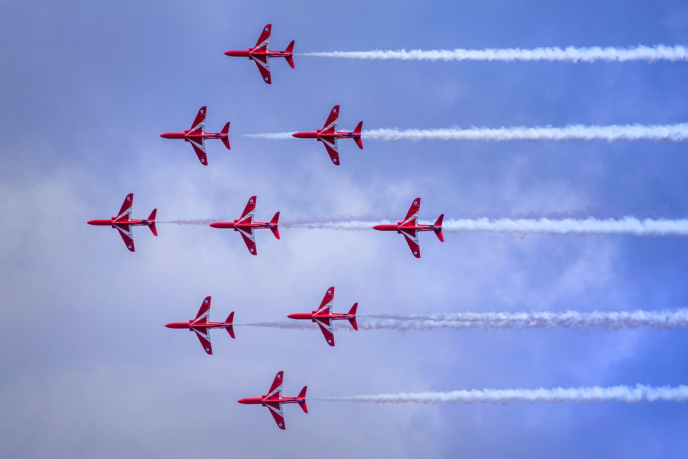 Red arrow formation in sky 