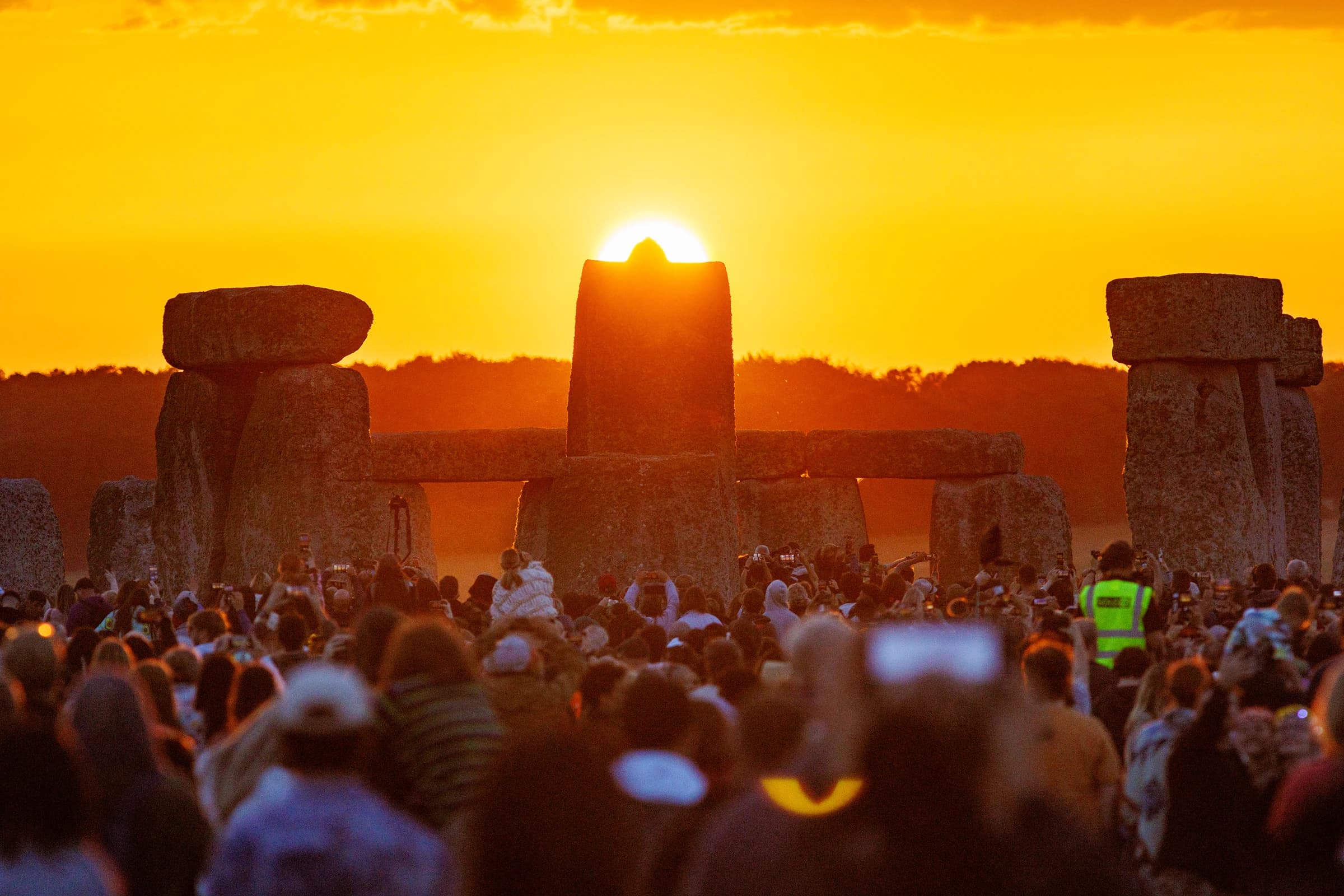 People celebrating at Stonehenge