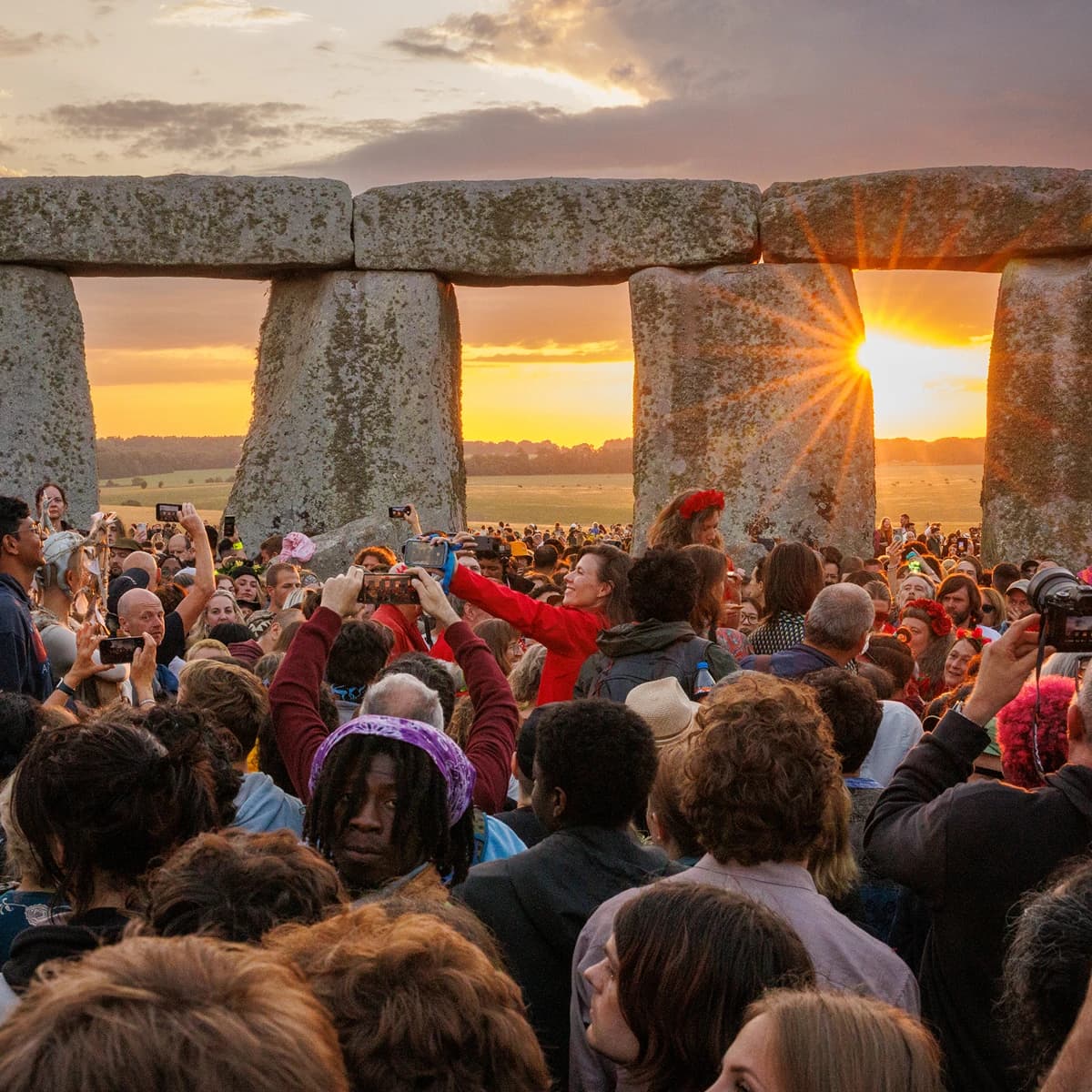 People celebrating at Stonehenge